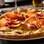 Pizza individual Nova 68, com mozzarella de búfala, abobrinha italiana e presunto de Parma, na 68 La Pizzeria. Foto: Divulgação/Restaurant Week SP