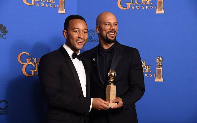 John Legend e Common com o prêmio de melhor canção original por 'Glory', do filme 'Selma'. Foto: AP
