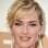 Kate Winslet: franja chique com ondas. Foto: GettyImages