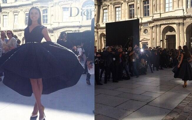 Isis Valverde com seu vestido maravilhoso e sendo fotografada na entrada do desfile da Dior