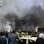 Fumaça e carros destruídos na praça Sabaa Bahrat, em Damasco, após explosão de carro-bomba (08/04). Foto: AP