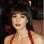 Monica Bellucci usa fios longos e franja curta e arredondada. Foto: GettyImages