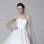 Vestido tomara que caia clássico, com aplicação de pedrarias. De Marchesa. Foto: Getty Images