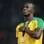 Bolt ouve o hino da Jamaica na cerimônia da medalha dos 200 m. Foto: Harry How/Getty Images
