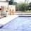 Elano pega Cida na piscina com Conrado e termina tudo com a namorada. Foto: Divulgação/TV Globo
