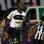 Em Goiânia, Seedorf entra em campo com pequenos botafoguenses antes do duelo entre a equipe do Rio e o Atlético-GO. Foto: Futura Press