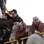 Passageiros chegam de balsa no porto de Santo Stefano, no continente italiano. Foto: AP