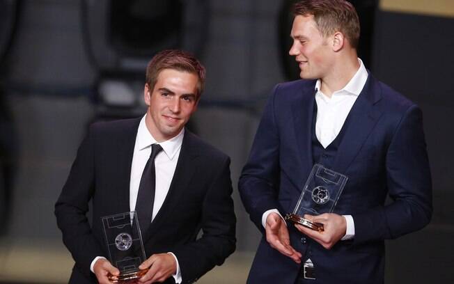Philipp Lahm e Manuel Neuer entraram para a seleção dos melhores do mundo de 2013. Foto: Ruben Sprich/Reuters