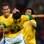Leandro Damião abre o braço para celebrar o terceiro gol do Brasil. Foto: AFP