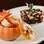 Camarão na minimoranga com arroz negro tostado na manteiga de garrafa com castanhas, no Bistrô 28. Foto: Divulgação/Restaurant Week SP