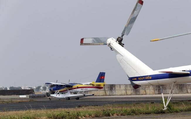 Equipes de resgate participam das buscas por vestígios do avião desaparecido com 239 pessoas a bordo (9/3). Foto: AP