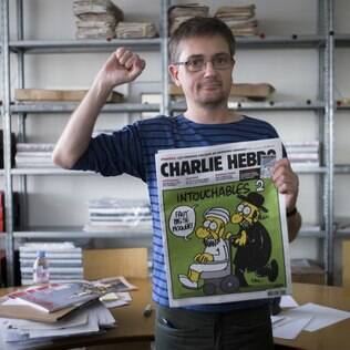 Charlie Hebdo, conhecido como Charb, mostra capa polêmica. Charb foi morto no ataque