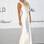 Paris Hilton arrasou com o vestido branco com aplicações prateadas. Para complementar, joias da mesma cor com pedras verdes. Chique. Foto: Getty Images