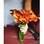 Os tons do outono estão no buquê de callas terracota com acabamento em junco, perfeito para outono-inverno, quando a flor está em seu melhor momento. Da Flor & Forma. Foto: Divulgação