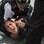 Integrante do femen grita enquanto é detida pelo policial. Foto: AFP