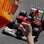 Alonso carrega bandeira espanhola em volta de comemoração pela vitória em Valência. Foto: AP