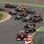 Mais atrás, Kimi Raikkonen ultrapassa seu companheiro de Lotus, Romain Grosjean, e ganha a terceira posição. Foto: EFE