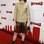 A atriz Nora Tschirner arrasou ao combinar saia metalizada com camisa militar e botas, em um look moderno e cheio de personalidade. Foto: Getty Images