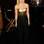 A atriz Elisha Cuthbert escolheu vestido tomara-que-caia preto com top metalizado, uma boa opção para fugir do pretinho básico numa festa. Foto: Getty Images
