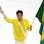 Hugo Hoyama entrou com a bandeira brasileira e levantou a torcida presente no estádio. Foto: Jefferson Bernardes/VIPCOMM