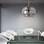 O lustre ‘Aro’ é feito em cristal puro e tem no design cromado seu grande destaque. Foto: Divulgação