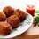 Bolinho de arroz da Vovó com linguiça defumada, queijo e temperos. No Veloso Bar, na Vila Marina, zona Sul. Foto: Photo 5/Divulgação