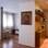 No apartamento de 75 m² as arquitetas Melissa Paro e Camila Missura transformaram o segundo quarto em home theater. Foto: Divulgação