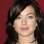 Lindsay Lohan com franja média e cabelo comprido. Foto: GettyImages