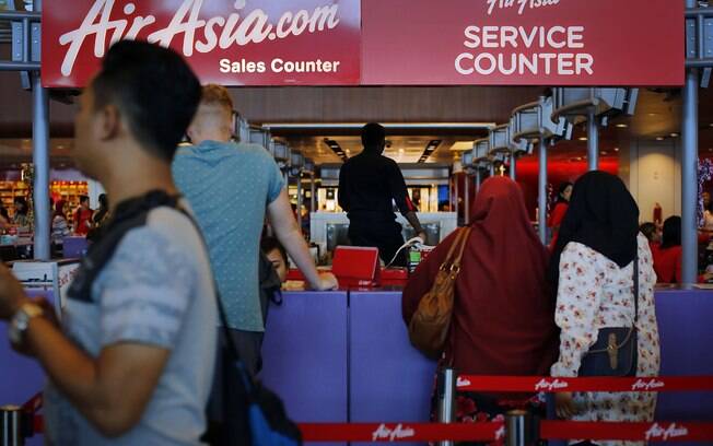 Passageiros e tripulação somam 162 pessoas no voo da AirAsia. Foto: AP Photo/Wong Maye-E