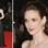 Winona Ryder não ousou muito, mas estava chique com o tomara-que-caia da dupla Dolce&Gabbana . Foto: Getty Images