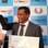 Pelé Reis recebe cheque simbólico de R$ 3 milhões da Telexfree em 2012. Foto: Reprodução