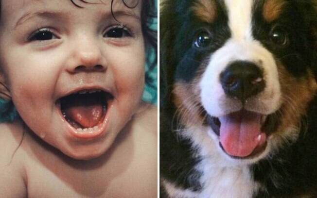 Menininha e cachorrinho rindo.