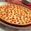 Quiche de queijo de cabra com tomate cereja. Foto: Divulgação