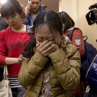 Familiares de passageiros do voo MH370: confirmação da queda acabou com esperanças de encontrar sobreviventes