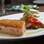Contra-filé ao molho chimichurri guarnecido com risoto de açafrão com brócolis. Foto: Divulgação/Restaurant Week SP