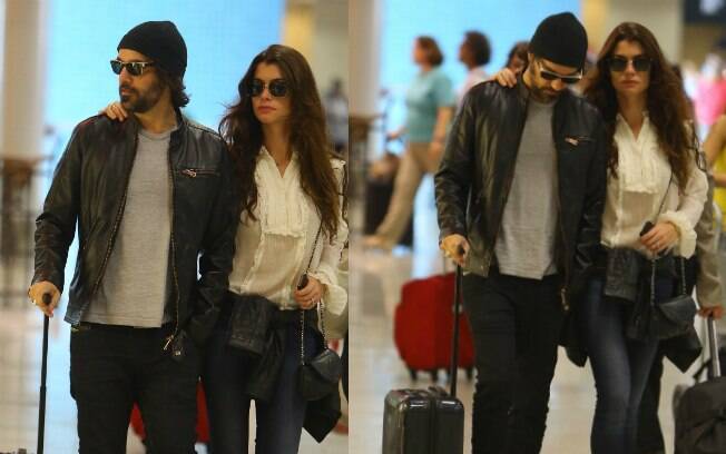 A atriz e o namorado não tiraram os óculos escuros no aeroporto