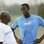 Bolt e seu técnico, Glen Mills, durante treino em 2006. Foto: Michael Steele/Getty Images