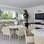 Sala de almoço sem televisão? Nem pensar. O arquiteto Rogério Perez  deu posição de destaque ao aparelho. Foto: Divulgação