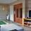 Para aumentar o relaxamento do spa, nada melhor do que assistir à televisão, certo? Projeto da designer Cristina Bárbara. Foto: Divulgação