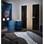 Não tem criado-mudo? Use tambores de metal pintados como no quarto decorado pela loja Florense. Foto: Divulgação