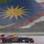 Webber passa em frente à bandeira da Malásia. Foto: AP