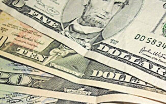 Dólar sobe 13% em 2014 e fecha a R$ 2,66