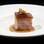 Pancetta com molho de missô e castanha. Foto: Taiana Laiun/ Divulgação