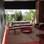 O ambiente assinado pelo designer de interiores baiano Gustavo Jansen privilegia o conforto. O tom Marsala (tendência de 2015) foi harmonizado com detalhe madeirados. Foto: Chames Oliveira