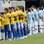 Brasileiros escutam o hino antes do início da partida. Foto: AP