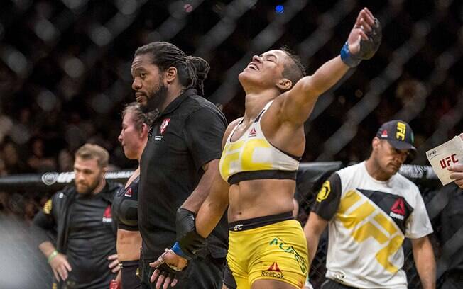 Amanda Nunes venceu a americana Miesha Tate e se tornou a primeira mulher do país a conquistar um cinturão