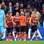 Atletas do time ucraniano comemoram gol sobre os dinamarqueses. Foto: AFP