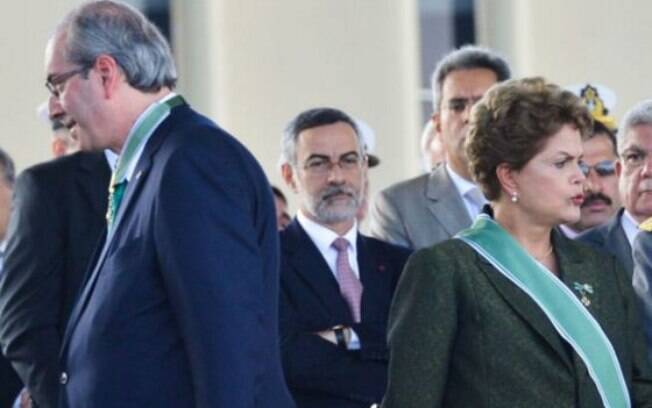 A presidente Dilma ao lado presidente da Câmara, Eduardo Cunha, que abriu processo contra ela