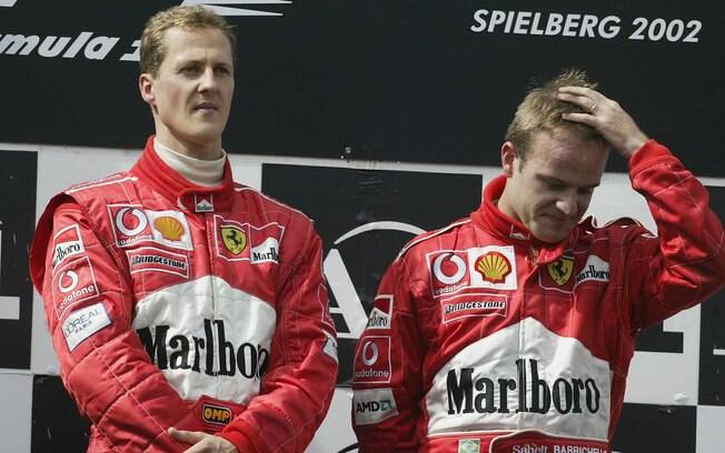 A maior derrota de Schumacher aconteceu no GP da Áustria de 2002, quando Barrichello deixou o alemão passar e vencer a prova. Foto: Getty Images