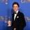 Eddie Redmayne com o prêmio de melhor ator de drama por 'A Teoria de Tudo'. Foto: AP